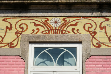 Wall Mural - detail of an art nouveau azulejos frieze on a house in Braga, Portugal