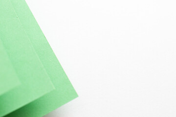 Wall Mural - Green and white 3d geometric background, close up
