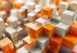 A dynamic and eye-catching 3D-rendered image of colorful cubes in a seemingly random pattern of orange tones, symbolizing creativity and energy