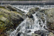 water cascading over rocks  at the spillway,