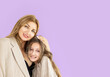 © Mykola - Woman mama in light suit have fun with cute teen girl. Mother little daughter isolated on pastel pink wall background studio portrait Mother's Day love family parenthood childhood concept.