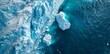 Icebergs and ice from a glacier in the arctic natural landscape in Ilulissat, Greenland. Aerial drone photo of an iceberg on the Ilulissat iceberg.