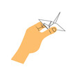 hand holding a paper crane
