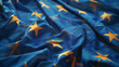 Dettaglio di bandiera dell'Unione Europea in cui si vedono bene le stelle gialle e lo sfondo blu