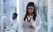 © peopleimages.com - Call center, tablet and woman in office with headset for customer service, research and support. Consultant, company and person with digital technology for communication, telemarketing and networking