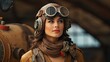 © Balaraw - Adventurous woman wearing vintage pilot goggles and scarf