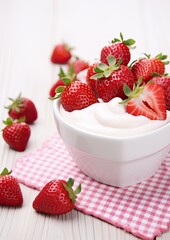 Wall Mural - fresh strawberries with cream in a white bowl