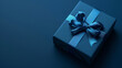 © Nate - Blue gift box on dark blue background