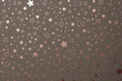 Scrapbook grain paper blank with star gold pattern wall . Texture relief copy space wallpaper background.