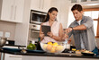 Couple, cooking and tablet for recipe, kitchen and home with online, cheerful and making dinner. Food, digital and together with internet, family and nutrition while streaming, teaching and learn