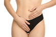 © New Africa - Gynecology. Woman in underwear on white background, closeup