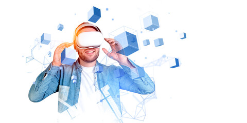 Wall Mural - Young man in vr headset, blocks in metaverse. Copy space