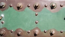 Texture Of Aged Copper Plate With Green Patina Stains And Rivets Old Weathered Metal Backdrop