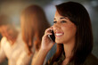 © peopleimages.com - Woman, office and cellphone with smile in phone call with client for crm in workplace for business, growth and services as manager. Sales agent, customer and tech for support, company and management