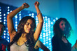 © peopleimages.com - Dancing, woman and confidence in nightclub for birthday, new year and party or disco in Mexico. Smile, enjoyment and eyes closed in festival for concert, music and celebration on dance floor in city
