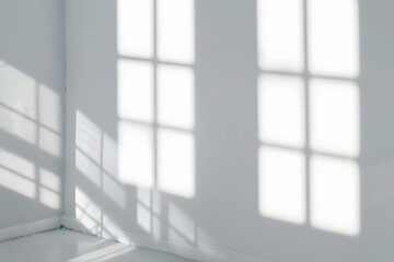 Wall Mural - Window shadow drop on white wall background