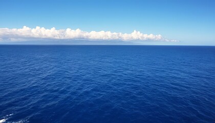 View of blue calm tropical ocean, blue clouds, summer composition, calm and beautiful summer landscape, Concept of travel, vacation, tourism, tour