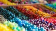 Assorted beads of different colors and shapes arranged on a table, each bead representing a unique identity
