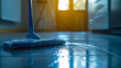 A blue mop is on the floor in a kitchen