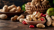 Whole and shelled peanuts displayed in wooden bowls on a rustic table, with a dark, textured background.