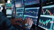 © AvectStock - Close-up of a stock broker's hands analyzing charts and data on multiple screens, focus on screens. Business concept for stock market. financial chart graphs concept