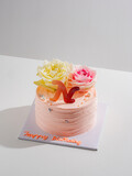 Fototapeta Miasta - Delicious birthday cake with candle on light blue background.panoramic cover or banner concept.