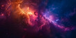 A colorful galaxy with a purple and orange cloud in the middle