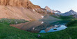Fantastic sunrise panorama of picturesque little lake in the Swiss alps, Fluhsee, close to Lenk in Bernese Oberland, Europe. Beauty of nature concept background