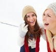 Winter, snow and girl friends laughing outdoor on skiing vacation, adventure or holiday for travel. Happy, smile and young women with fashion for bonding in cold weather on weekend trip in Iceland.