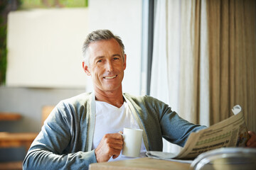 Sticker - Mature, man and newspaper for reading in home, relax and information or articles in morning with coffee. News, breakfast table and rest and calm for entertainment pages, current events in apartment