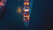 Aerial top view of Container ship loading and unloading, Cargo container in deep seaport for the international order. Transportation and travel concept.