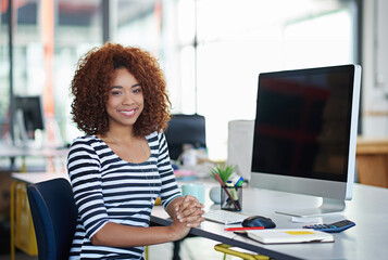 Happy businesswoman, portrait and pc at desk in office for career, programmer and website. African female person, creator and graphic design at workplace for web development of startup company