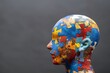 © Yurij - Human head profile with jigsaw puzzle pieces - cognitive psychology or psychotherapy concept