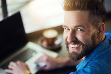 Poster - Portrait, man and cafe in laptop, smile and working or freelancer, remote work and male person. Typing, email and internet connection in copywriting, online job and seo research at coffee shop