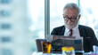Business partner executive smart man sitting and reading newspaper in restaurant. Old people businessman see the time and waiting your partner for meeting and taking about work.  Business Concept
