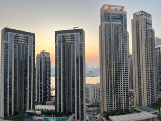 Wall Mural - Skyscrapers view at the sunset time