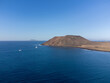 Aerial view Corralejo dunes, white sandy beach, blue water, Lobos and Lanzarote islands, Fuerteventura, Canary islands, Spain