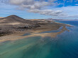 Aerial view on sandy dunes and turquoise water of Sotavento beach, Costa Calma, Fuerteventura, Canary islands, Spain in winter