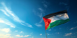 Fototapeta  - Palestine flag in the blue sky. Horizontal panoramic banner.