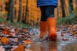 © NikahGeh - puddles and splash with rain boots professional photography