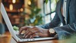 © Nijat - businessman working on a laptop using FTP (File Transfer Protocol) with a paperless system