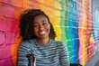 A smiling African American entrepreneur in a wheelchair against a rainbow backdrop. Generative Ai