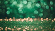 Shiny sapphire glittery bokeh with green and gold colors sparkling festive light spotted backdrop.