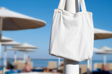 Fototapeta Łazienka - Mockup shopper handbag hanging on the beach