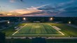 Majestic football stadium at dusk, floodlights illuminating the field in a radiant glow