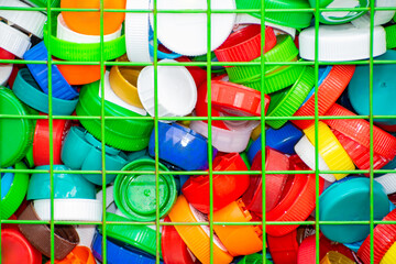 Collected colorful plastic caps for recycling. concept of conservation and protection of the natural environment.
