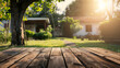 a wood table space with home backyard, blurred background for advertising template