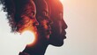 © Khalida - Woman face silhouette in profile with a group of African and African American women faces inside.Concept of racial equality antiracism and a woman who gives a voice to other women.Allyship