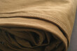Close up shot of beige denim jeans.