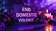Vivid digital banner advocating 'End Domestic Violence' with decorative elements